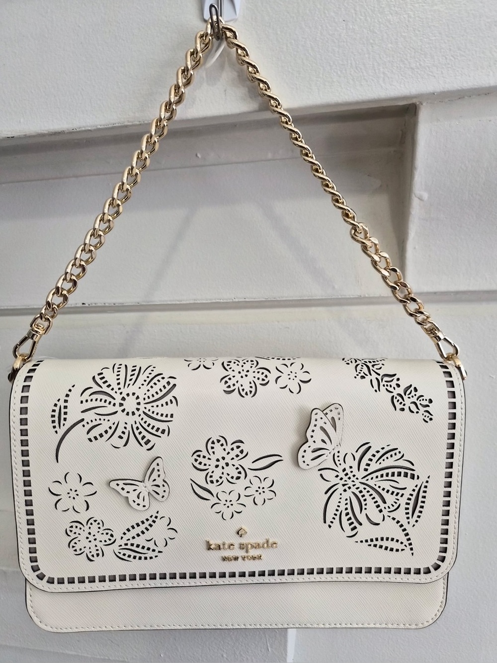 Kate Spade  Madison perforated willow convertible crossbody bag.